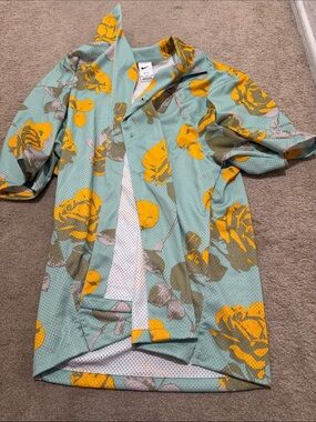 Nike Men’s Mint Green Short-Sleeve Floral Jersey with Yellow Print